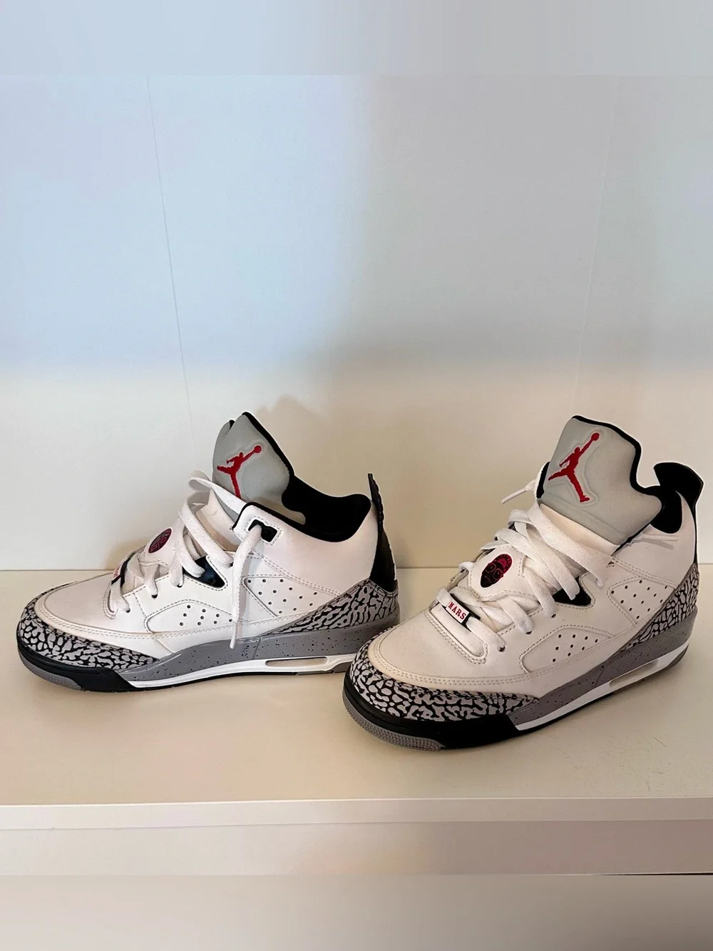 Jordan Son of Mars Low Basketball Sneakers in White, Black and Red Boy 4.5Y